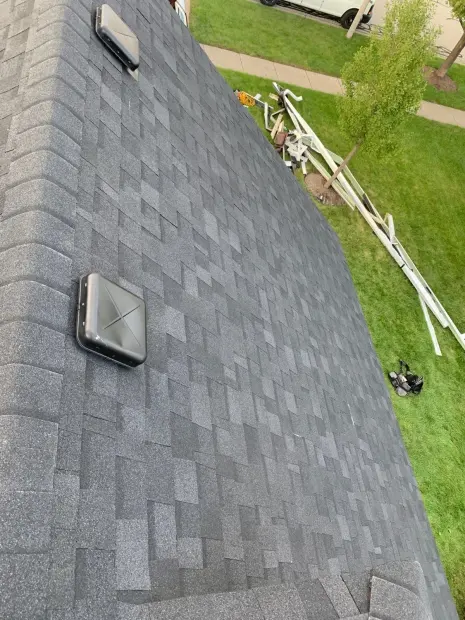 Completed roof and exterior repair project by RG Roofing & Exteriors