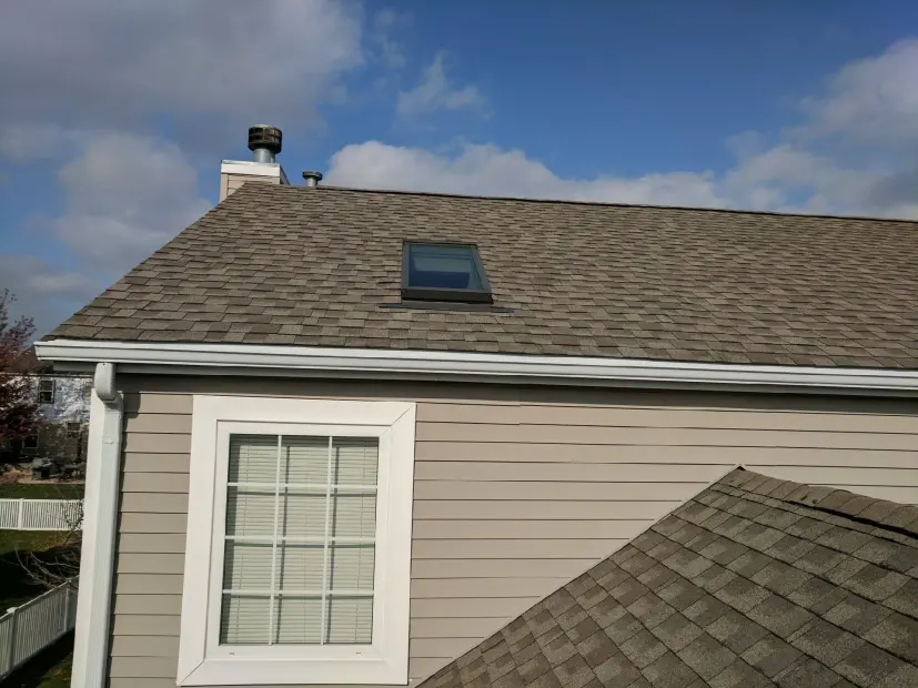 Completed asphalt shingle roof replacement by RG Roofing & Exteriors